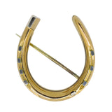 horseshoe brooch